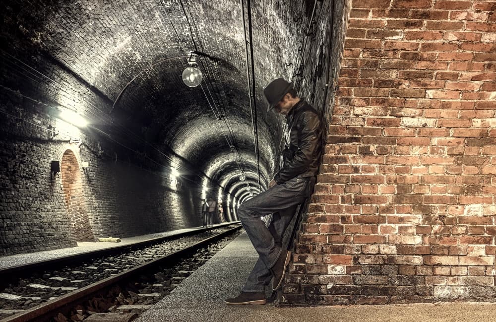 Moody Subway Man by Tomoshi Hara — canvas wall art