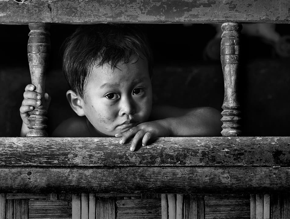 Pensive Young Boy by Sebastian Kisworo — canvas wall art