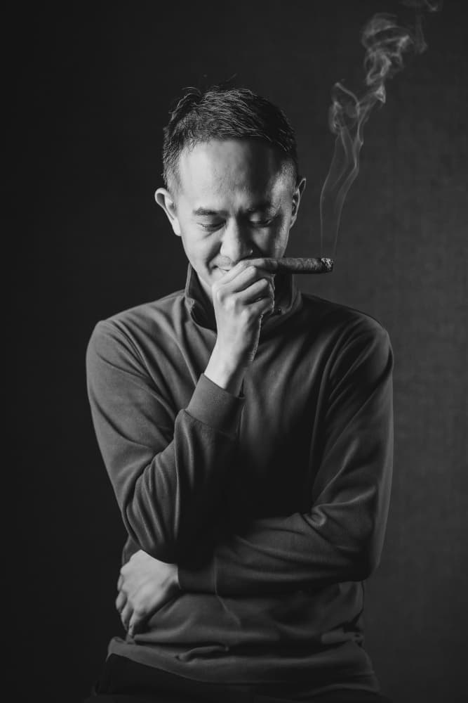 Thoughtful Man Smoking by qiye — canvas wall art