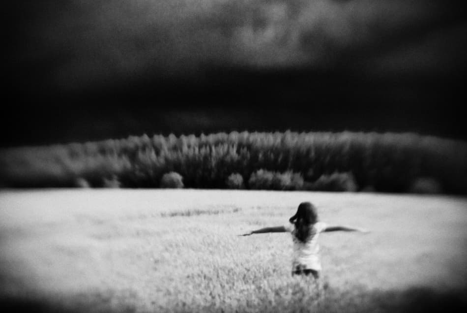 Girl Under Dark Sky by Codrin Lupei — canvas wall art