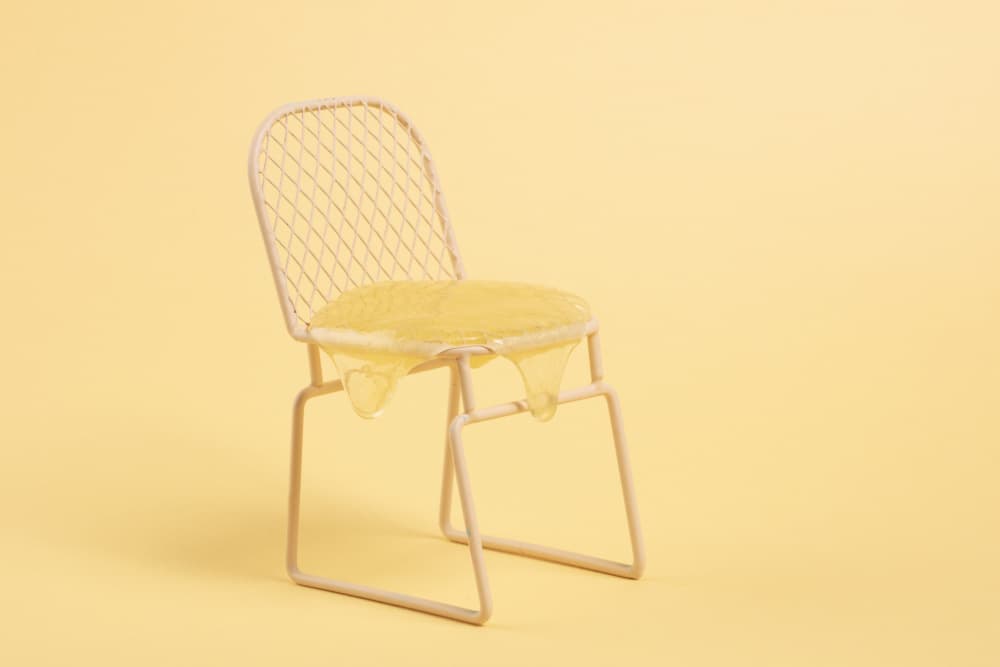 Melting Yellow Chair by Julia Ramiro — canvas wall art