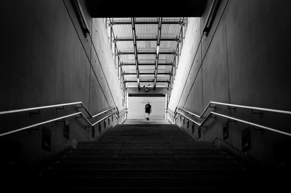 Lone Walker Subway Stairs by Tamas Dragon — canvas wall art