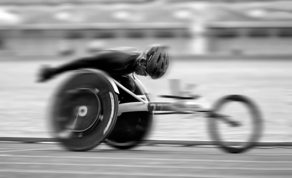 Dynamic Wheelchair Racing by Antonyus Bunjamin (Abe) — canvas wall art