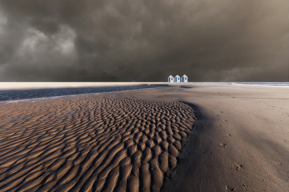 Stormy Beach Huts by Uschi Hermann — canvas wall art