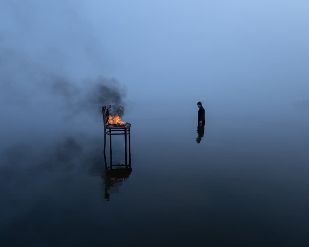 Misty Man Burning Chair by Leszek Paradowski — canvas wall art
