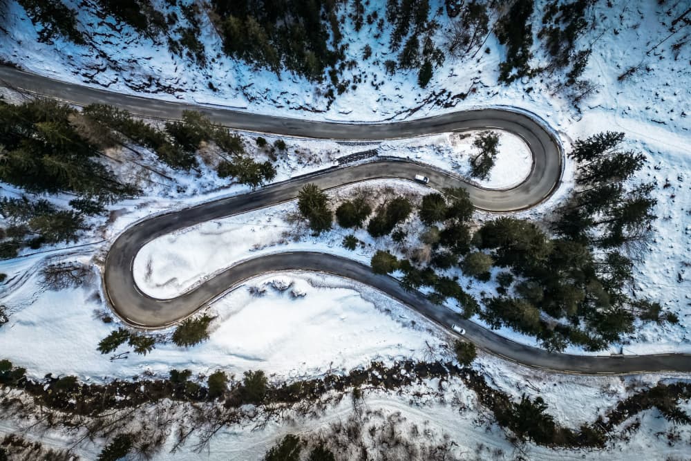 Winding Snowy Mountain Road by Joško Šimic — canvas wall art