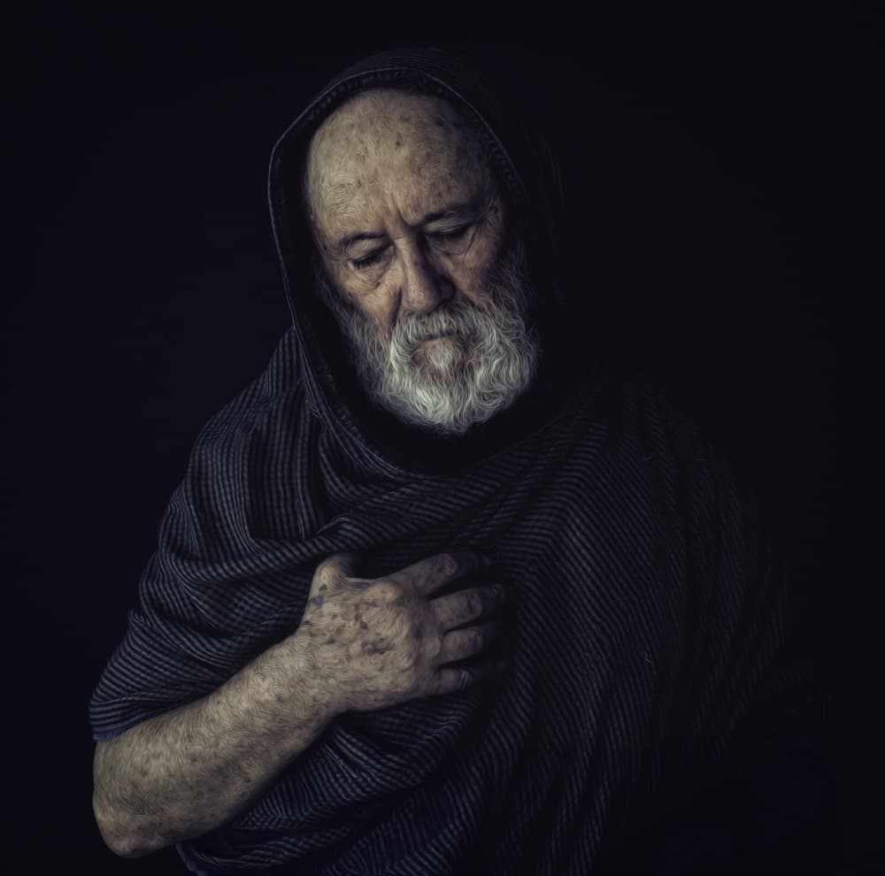 Pensive Hooded Elder by Yuri Shepelev — canvas wall art