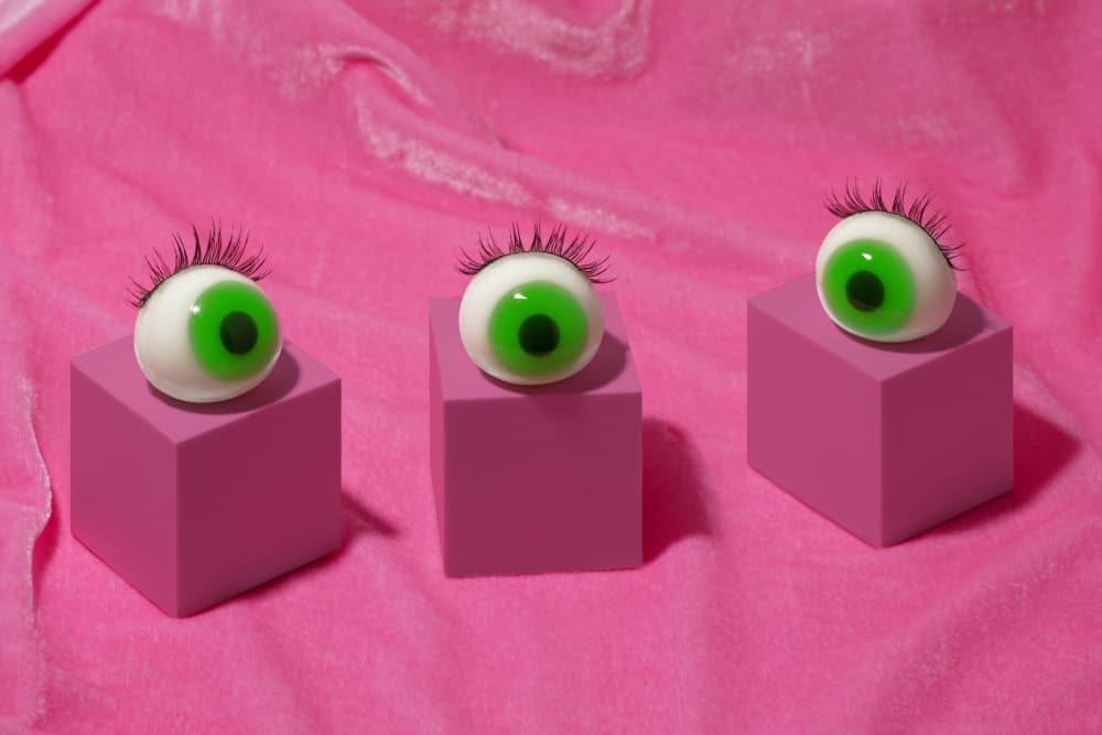 Green Eyeballs on Pink by Julia Ramiro — canvas wall art