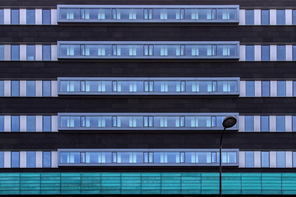 Geometric Blue Facade by Theo Luycx — canvas wall art