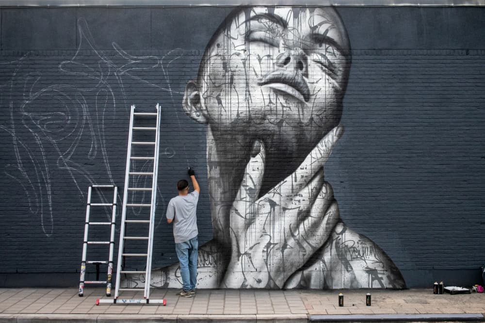 Pensive Urban Mural by Lus Joosten — canvas wall art