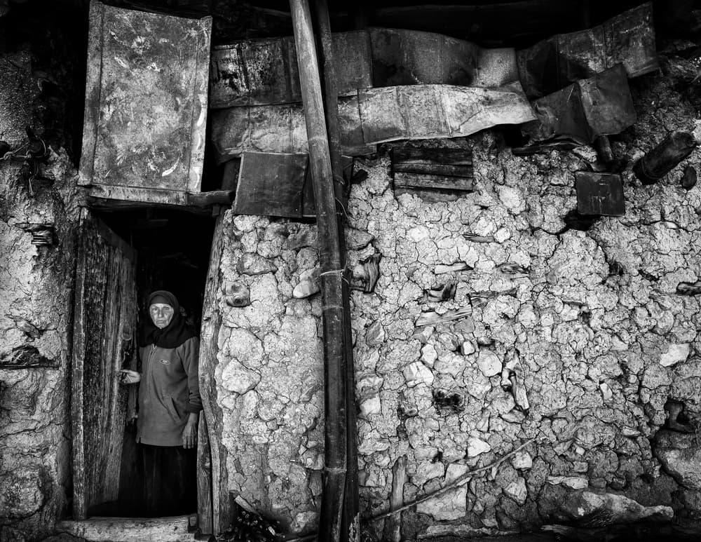 Aged Woman Doorway by Mohammadreza Momeni — canvas wall art
