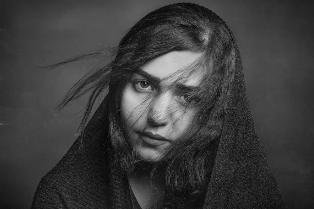 Intense Windswept Portrait by Amir Heydari — canvas wall art