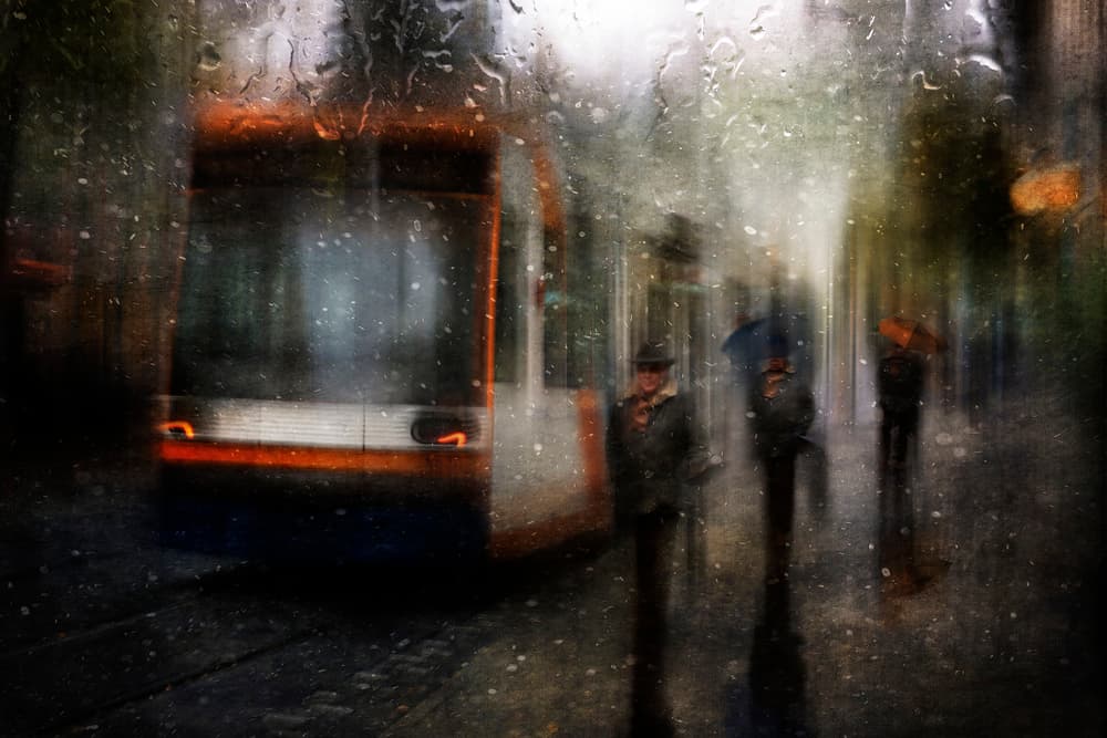Rainy City Tram by Charlaine Gerber — canvas wall art