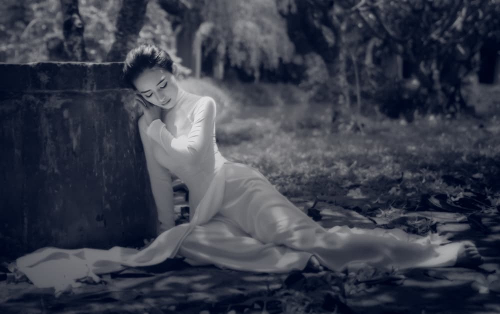 Serene Woman in Ao Dai by Nguyen Tan Tuan — canvas wall art