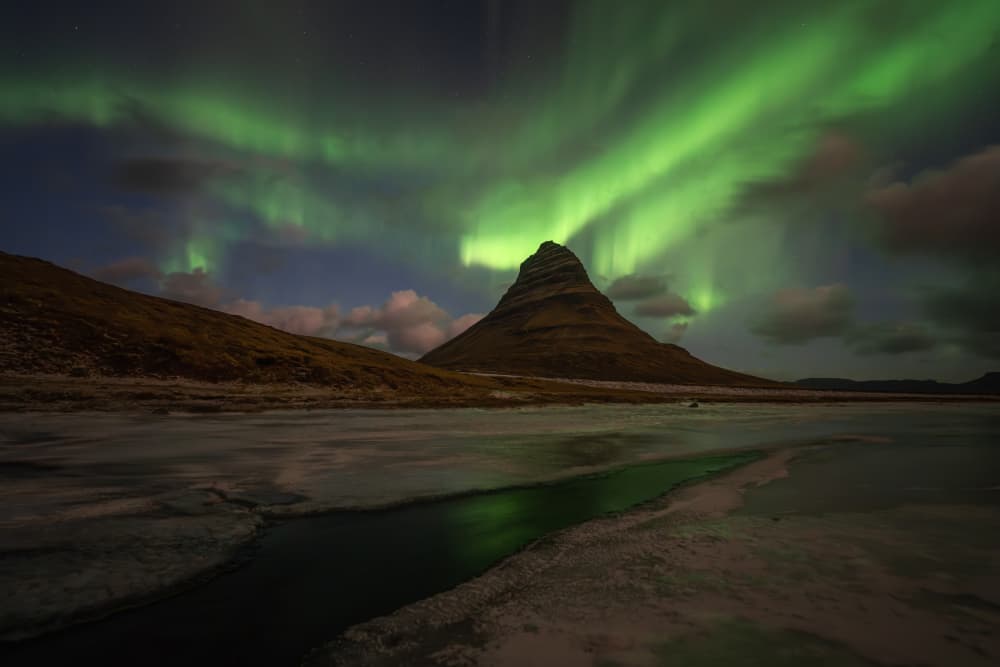 Green Aurora Over Kirkjufell by Yongnan Li (李永男) — canvas wall art