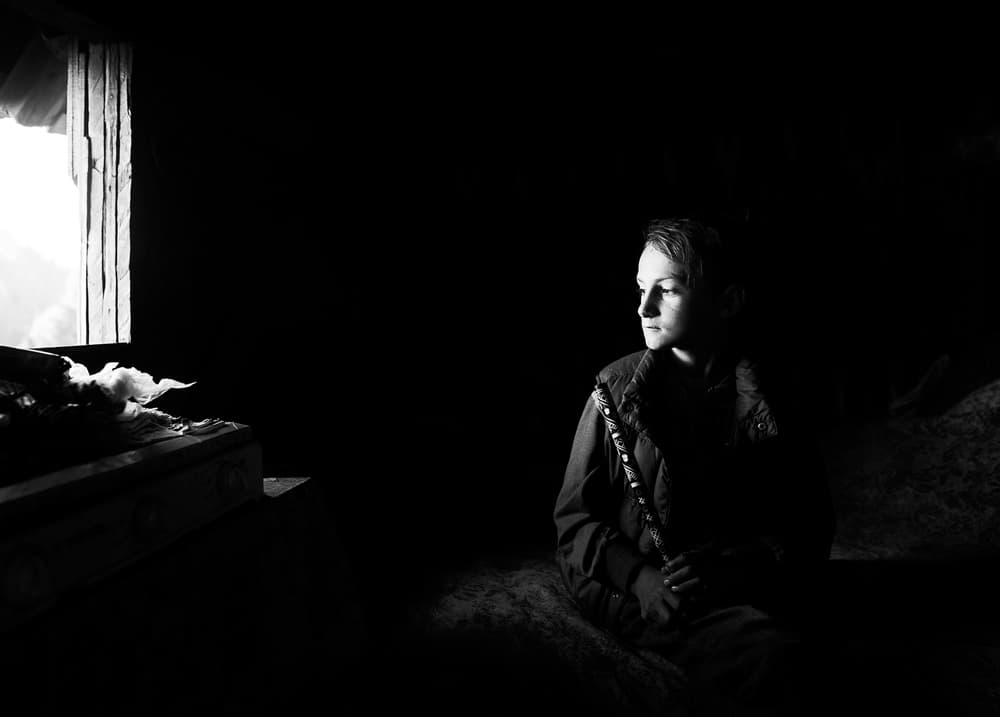 Thoughtful Boy With Flute by Julien Oncete — canvas wall art