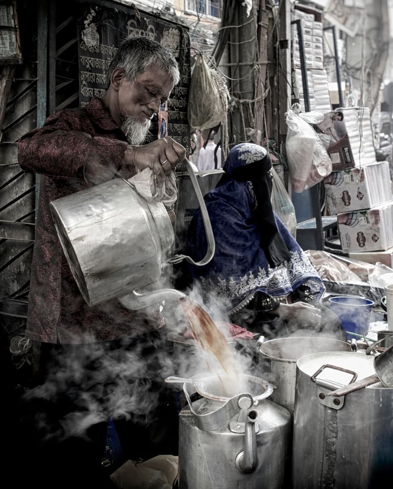 Man Pouring Steaming Tea by Elena Molina — canvas wall art
