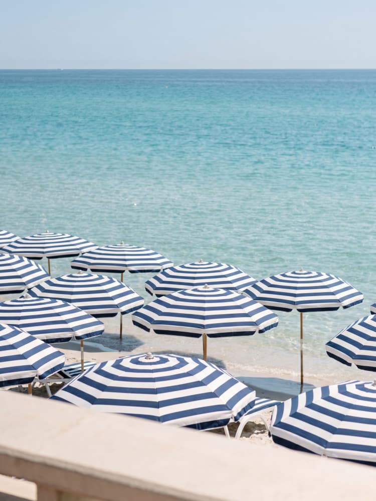 Striped Umbrellas Beach Day by Andreas Magnusson — canvas wall art