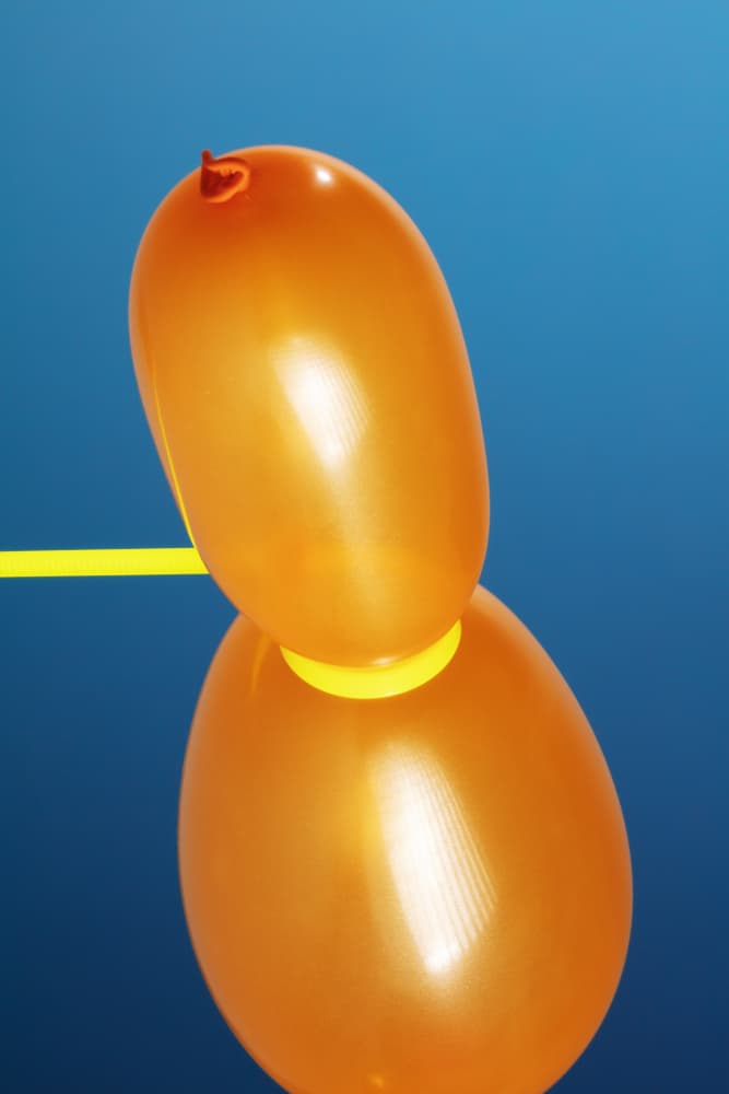 Playful Orange Balloons by Julia Ramiro — canvas wall art