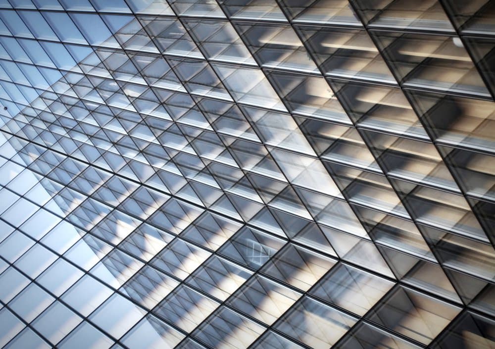 Geometric Glass Facade by Anna Cseresnjes — canvas wall art