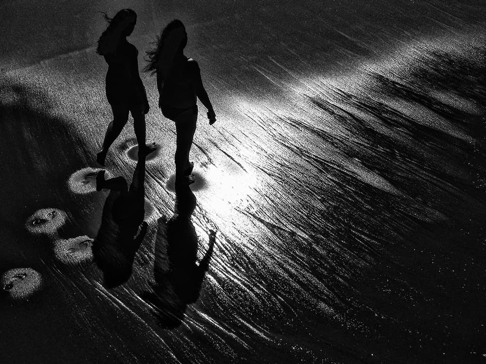 Beach Walk Silhouettes by Massimo Della Latta — canvas wall art
