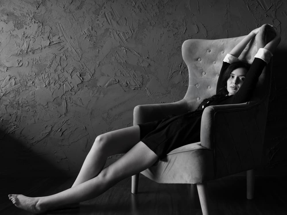 Elegant Woman Relaxing by Yoram GIL — canvas wall art