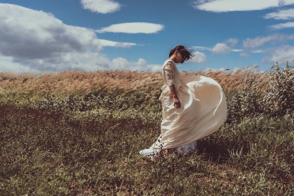Woman in Windy Field by Kurosaki Sangan — canvas wall art