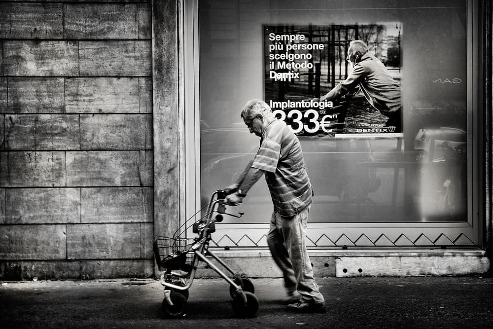 Elderly Man City Stroll by Antonio Grambone — canvas wall art