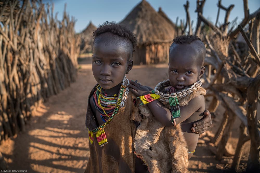 African Village Children by Sarawut Intarob — canvas wall art