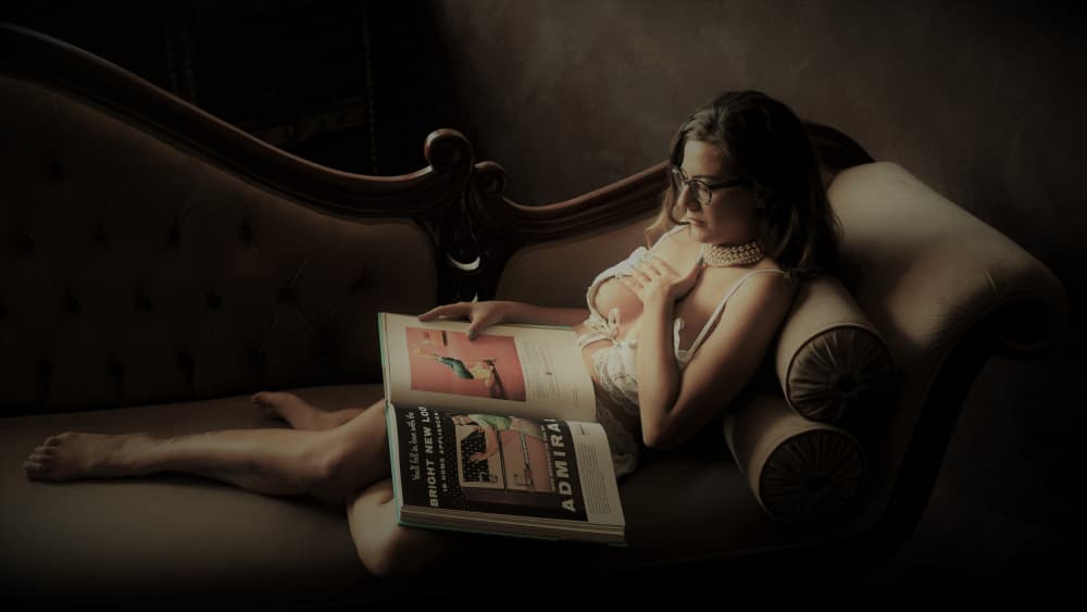 Sensual Reading on Couch by Yoram GIL — canvas wall art