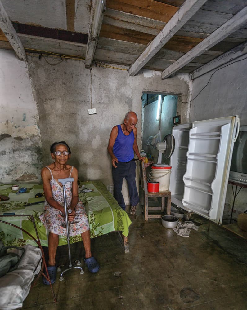 Elderly Couple's Humble Home by Tali Stein — canvas wall art