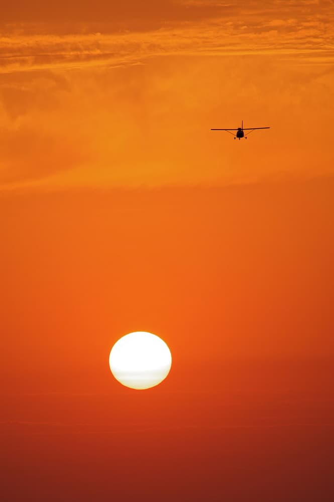 Sunset Plane Silhouette by Arsen Alaberdov — canvas wall art