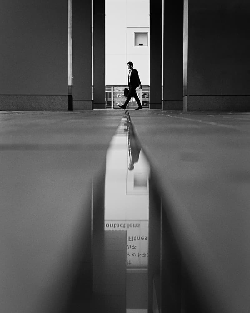 Man Walking Reflection by Yasuhiro Takachi — canvas wall art