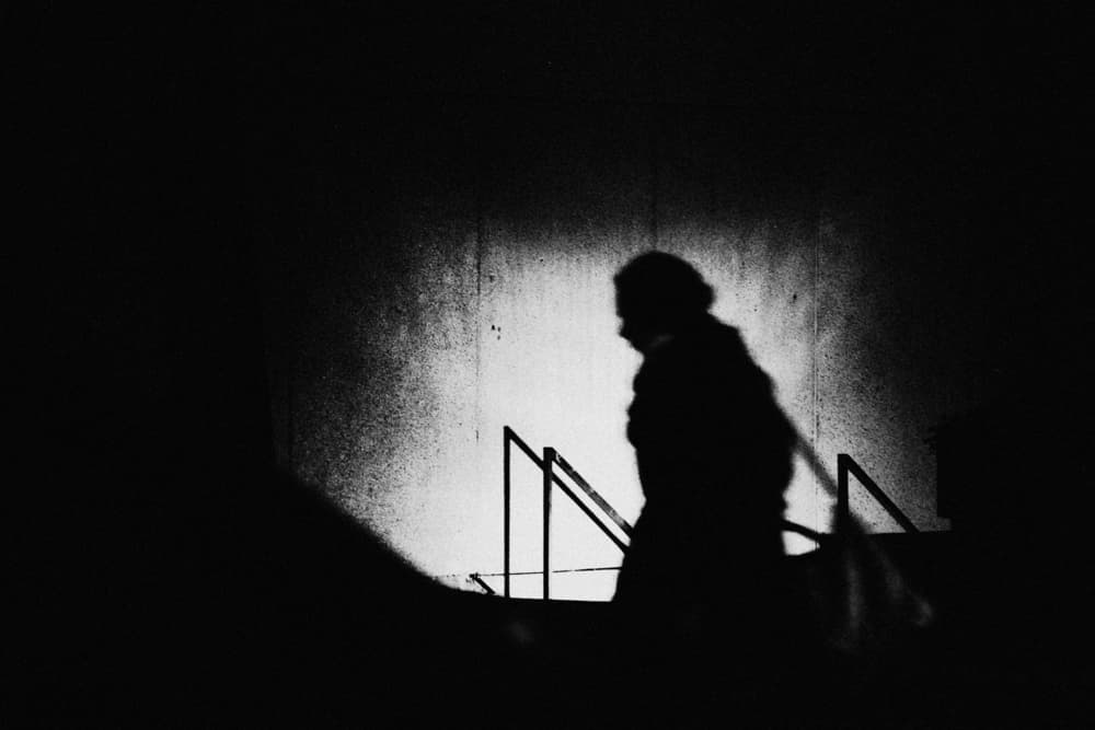 Shadow Figure on Stairs by Jian Wang — canvas wall art