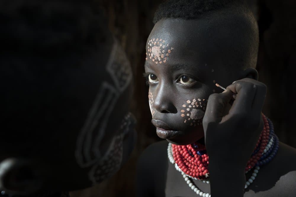 Reflective Tribal Face Paint by Sarawut Intarob — canvas wall art