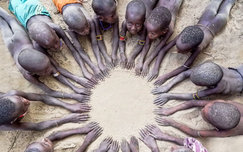 Circle of Childhood Hands by Iris Wiener — canvas wall art