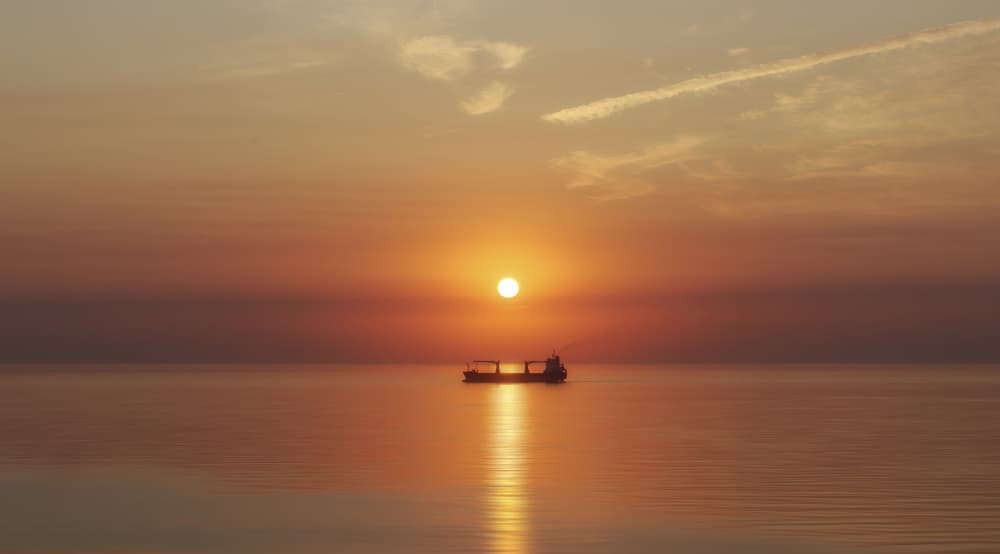 Golden Sunset Ship by Christiane Heggemann — canvas wall art