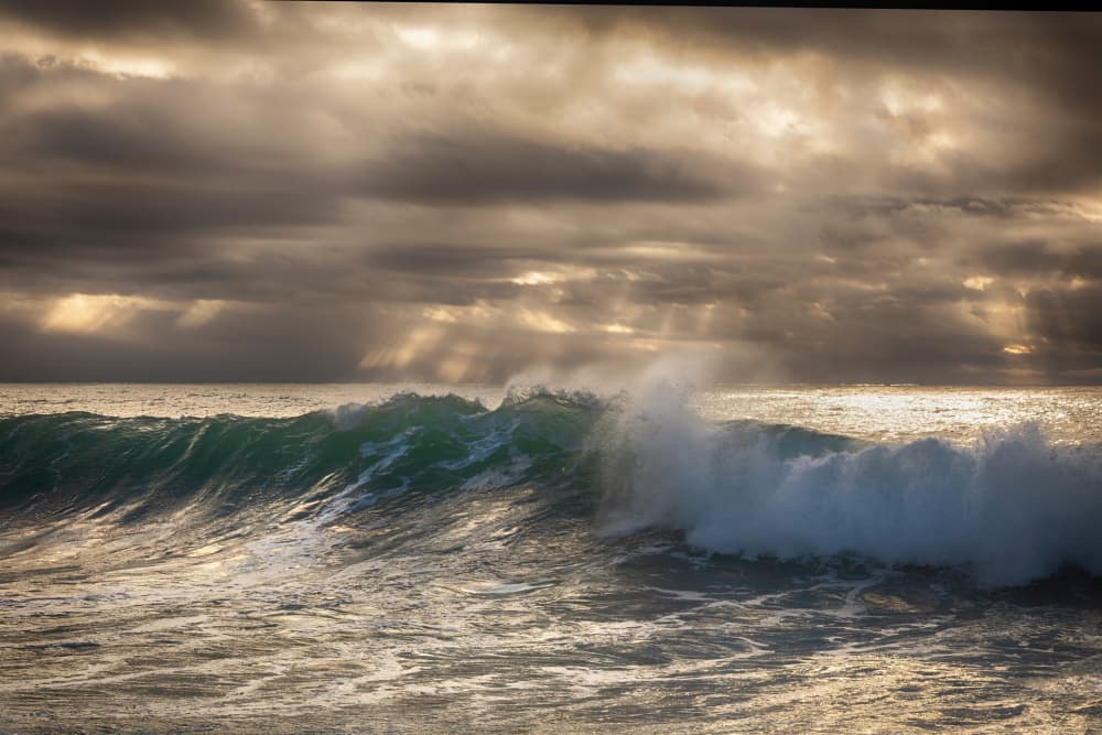 Sunbeams Over Ocean Waves by Paolo Bolla — canvas wall art