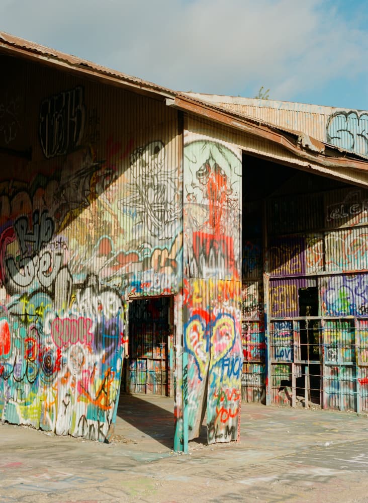 Colorful Street Art Building by Bethany Young — canvas wall art