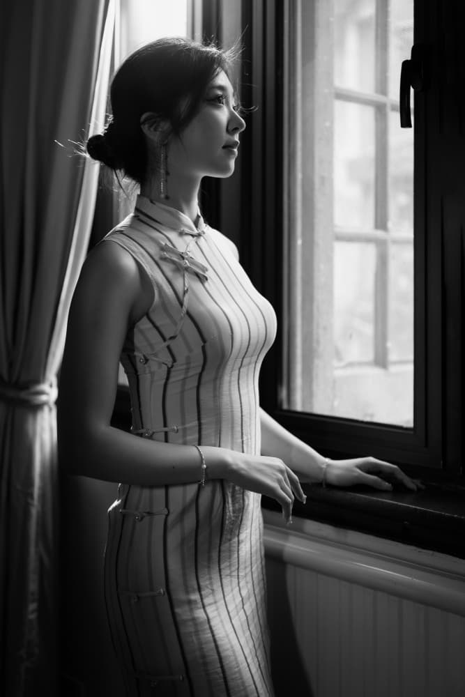 Elegant Woman By Window by Songlin Xu — canvas wall art