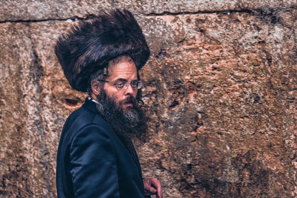Hasidic Man at Wall by Marco Tagliarino — canvas wall art