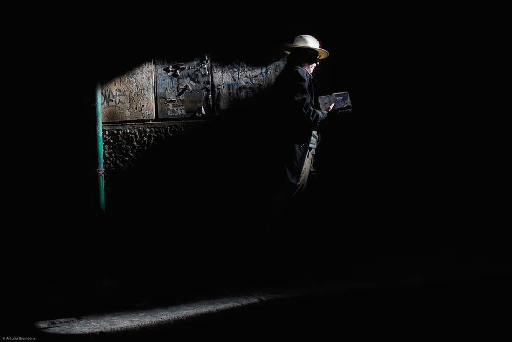 Man in Shadow Reading by Antonio Grambone — canvas wall art