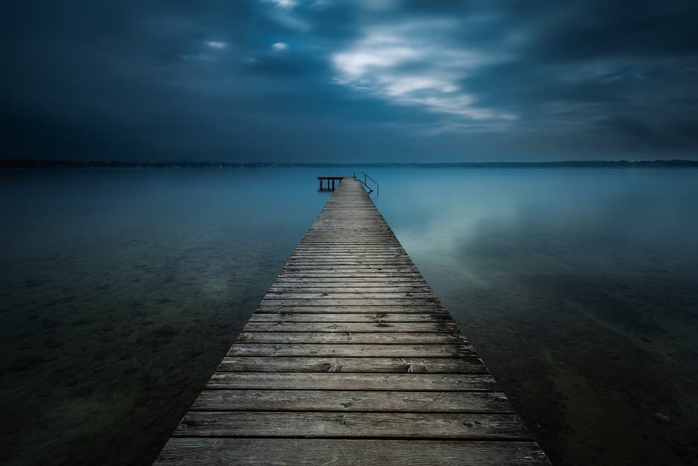 Moody Lake Pier by Ulrike Eisenmann — canvas wall art