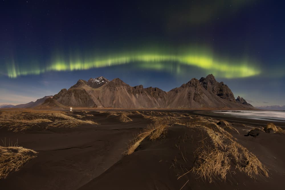 Aurora Over Black Sands by Dorian Gray — canvas wall art