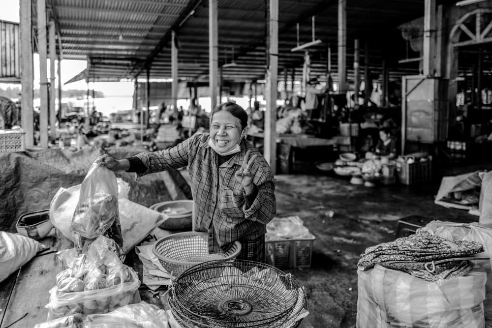 Smiling Market Woman by Luis Borges Alves — canvas wall art
