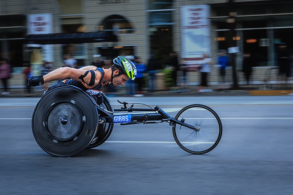 Speeding Wheelchair Athlete by Yimei Sun — canvas wall art