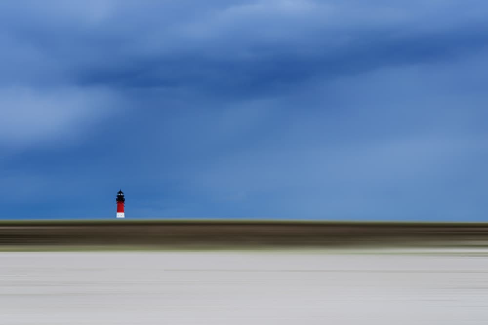Red Lighthouse Horizon by Rolf Endermann — canvas wall art