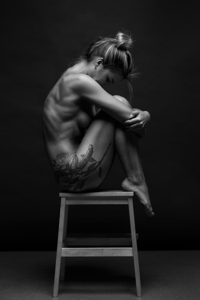 Pensive Woman Sitting by Anton Belovodchenko — canvas wall art