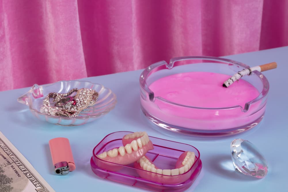Pink Ashtray Dentures by Julia Ramiro — canvas wall art