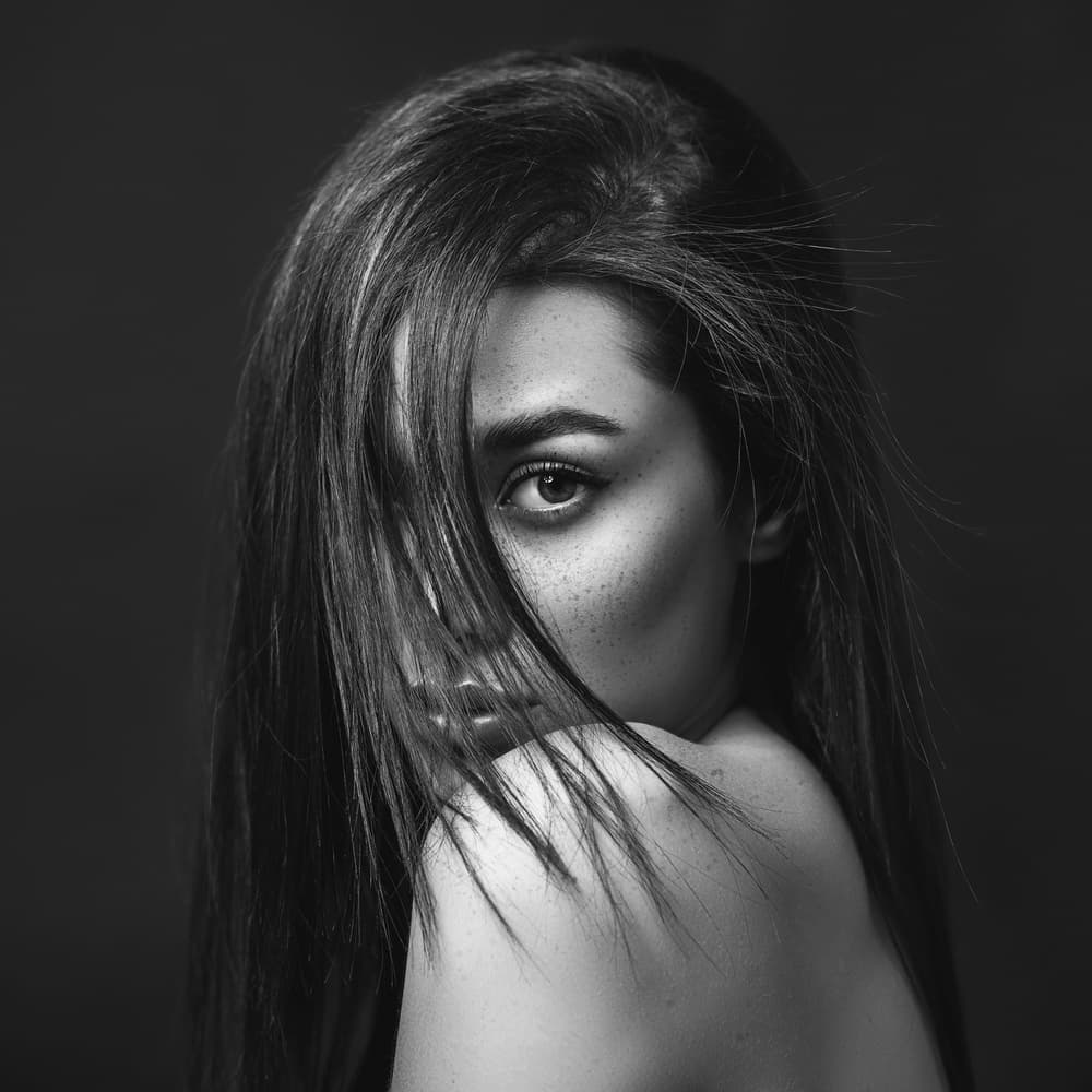 Mysterious Freckled Gaze by amir behzadi — canvas wall art
